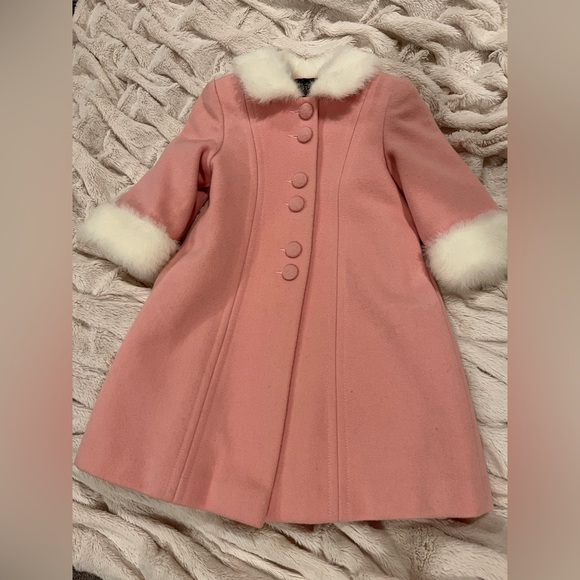 Pink Faux Fur coat. Elegant coat features a hand warmer plush accessory. - Picture 2 of 7